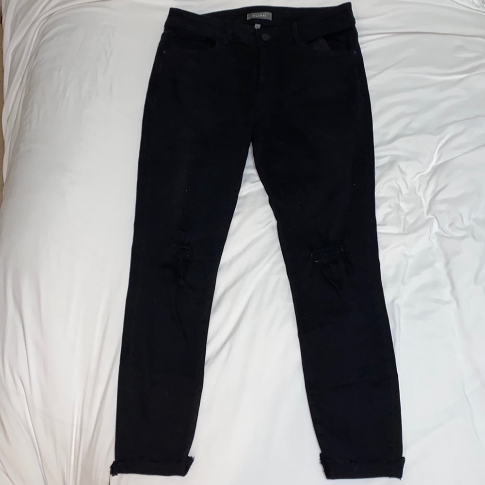Black jeans, knee rips